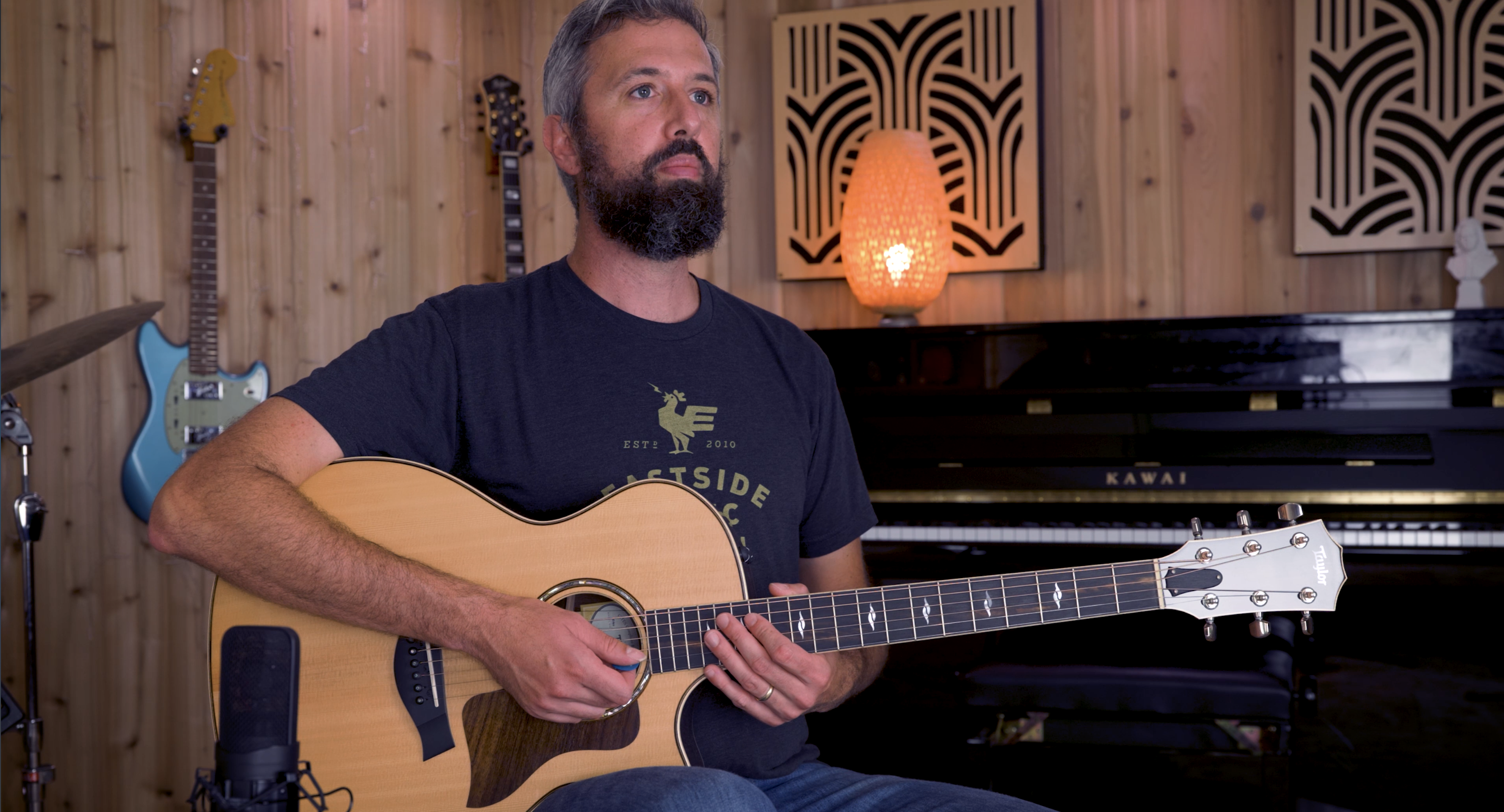 Demonstrating good posture on the guitar